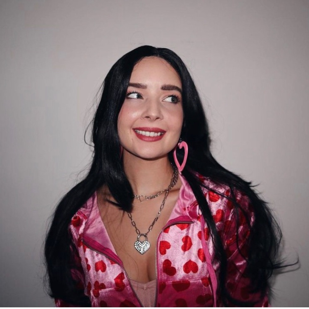 Jennifer’s Body costume w/ velour jacket, heart-shaped earrings, necklace + wig